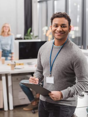 happy-african-american-man-with-name-tag-writing-s-2024-11-08-00-34-54-utc-scaled.jpg